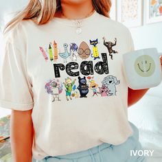 Read Children Books Shirt, Teacher Read Shirt, Kindergarten Gift Shirt,Comfort Colors,Read Kids Shirt,  Book Lover Shirt,Funny Kids Tee 1747 COMFORT COLORS - ADULT UNISEX - SHORT SLEEVE T-SHIRT - 1717 6.1 oz./yd² (US), 10 oz/L yd (CA), 100% ring-spun cotton, 30 singles Garment dyed for that lived in feel and almost no shrinkage at home. Soft ring-spun cotton fabric with 100% cotton threads Relaxed fit Topstitched, classic width, rib collar Shoulder to shoulder twill tape Signature twill label Ma Daycare Teacher Shirts Designs, Funny Character Print T-shirt For School, Casual School Shirt With Character Print, Cute Relaxed Fit Shirt For School, Bookish T-shirt With Funny Print For School, Fun School Tops With Funny Text, School T-shirt With Funny Print, Fun Relaxed Fit Shirt With Character Print, Fun Relaxed Fit Shirt With Cartoon Print