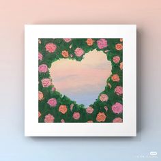 a heart shaped painting with pink and orange flowers