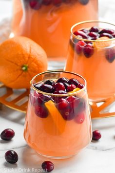 tropical cranberry sangria in glasses with orange slices