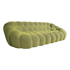 an image of a green couch on a white background