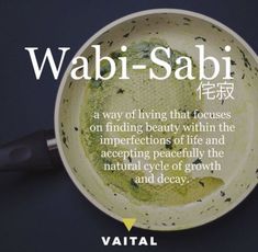 a bowl that has some kind of substance in it with the words wabi - sabi on it