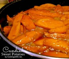 carrots cooking in oil in a pan on the stove