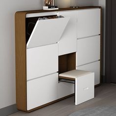 a white cabinet with drawers and a lamp on top