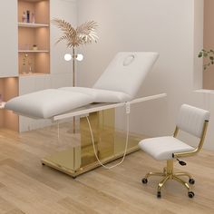 a chair and table in a room with white walls, wood flooring and shelving