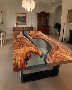 a table that has been made to look like a large piece of wood on it