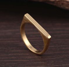 "Square Ring, Stacking Ring, Modern Ring, Brass Geometric Ring, Square Band, Boho Ring, Minimalist Jewelry, Simple Ring, Midi Ring Size:- All Size Available In Variation Metal:- Brass IMPORTANT NOTE....👇 1 product free gift on purchase of 3 products. You can choose the free gift as your wish. Take a screenshot of the free gift you like from my shop and send me a photo in personal message. MUST READ....👇 5 stars is my shop's priority. So contact me before leaving any negative review. I am here Gold Bar Ring, Lingot D'or, Signet Ring Men, Bold Rings, Bar Ring, Square Ring, Midi Ring, Geometric Ring, Ring Stacking