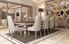 a dining room table with white chairs and a chandelier