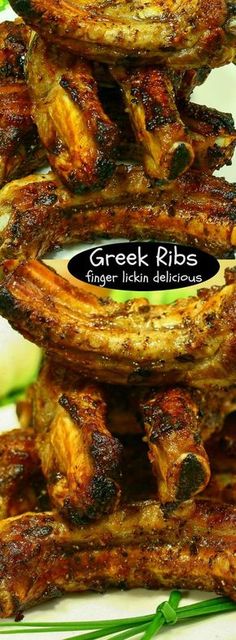 grilled chicken ribs are stacked on top of each other with the words greek ribs