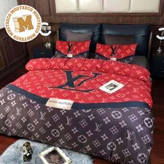 a bed with louis vuitton print on it