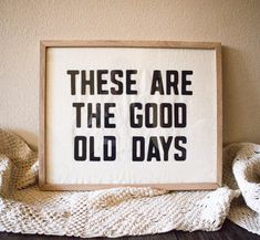 there are the good old days in black and white on this framed art print, which reads, these are the good old days