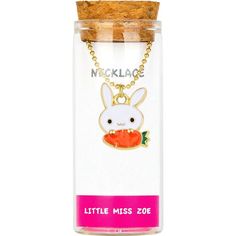 a bottle with a necklace on it that has a little miss zo in it