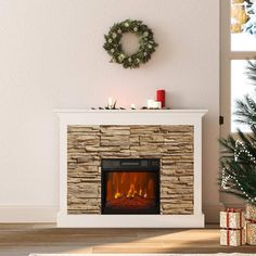 a living room with a fireplace and christmas decorations on the mantle, next to a wreath