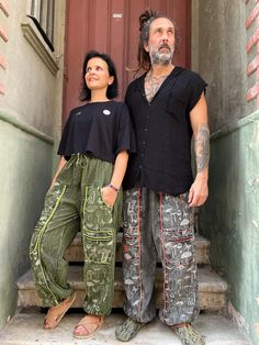 minimalist-gift-gifts-camping-festival clothing-hippie clothing-hippie pants-yoga pants-men harem pants - festival clothes-  - gift for him These unique Mushroom Patterned Nepal Harem Pants combine the best of bohemian style and comfort. Made from 100% natural cotton, these pants are soft on the skin, ensuring all-day comfort. Perfect for summer festivals, nature walks, camping, or casual daily wear, the relaxed fit offers freedom of movement for all body types. Featuring a practical design with deep pockets, this handmade piece brings the authentic touch of Nepalese craftsmanship to your wardrobe. Available in two sizes (S/M, L/XL), these pants embody both style and functionality. Reflect your free spirit with these vibrant, eco-friendly boho pants that effortlessly stand out in any setti Hippie Style Relaxed Fit Bottoms For Festival, Baggy Hippie Harem Pants For Festival, Bohemian Cargo Pants With Pockets For Festival, Hippie Festival Pants With Pockets, Hippie Harem Pants With Pockets For Festival, Hippie Style Baggy Pants For Festivals, Hippie Baggy Pants For Festivals, Bohemian Cargo Pants For Festivals, Bohemian Cotton Cargo Pants For Festivals