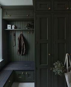 a coat rack in the corner of a room