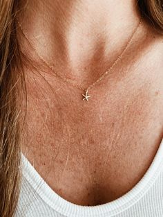 "All chains are 14K Gold Filled, does not tarnish and are water/sweat resistant. ITEM DETAILS: Chain - 14k Gold Filled 16\", 18\" or 20\" Pendant - 14K Gold Filled Starfish (Necklace Pictured on Model is 16\") Listing is for one necklace. Layered necklace photos are for inspiration only ❤️ Check out our Etsy Store to create a layered look. FREE SHIPPING - Items are made to order. Order time takes 3-5 business days. LJ Gold Designs is based in Southern California. We are two best friends who love natural beauty, nature, culture and travel. All of these passions inspire our jewelry designs." Sea Star Necklace, Gold Starfish Shaped Dainty Jewelry, Dainty Starfish Gold Jewelry, Dainty Gold Starfish Jewelry, Dainty Gold Starfish Necklace, Gold Starfish Charm Necklace, Minimalist Gold Jewelry With Starfish Charm, Minimalist Starfish Charm Jewelry, Delicate Necklace Gold