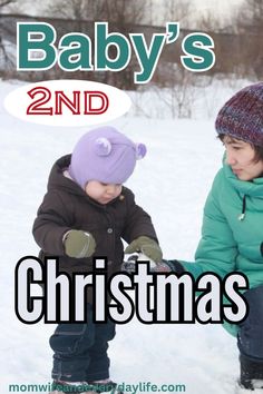 baby's 2nd christmas card with two children playing in the snow, and text that reads baby's 2nd christmas