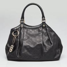 Gucci Gg Guccissima Sukey Vintage Rare Leather Lining Medium Shoulder Tote Bag Elevate Your Style W/ The Iconic Gucci Guccissima Sukey Shoulder Tote Bag In Luxurious Gg Leather. This Timeless Piece In Classic Black Exudes Sophistication & Elegance, Making It A Versatile Accessory For Any Occasion. The Spacious Interior Offers Ample Room For Your Essentials, While The Double Handles Ensure Comfortable Carrying. With Its Signature Guccissima Pattern & Gold-Tone Hardware, This Bag Is A Must-Have For Fashion Enthusiasts Seeking A Blend Of Style & Functionality. Add A Touch Of Italian Luxury To Your Wardrobe W/ The Gucci Sukey Tote. Rare All Leather- Including Interior Lining Baggage Claim, Tote Bag Black, Monogrammed Leather, Italian Luxury, Shoulder Tote Bag, Black Tote Bag, Shoulder Tote, Gucci Bag, Timeless Pieces