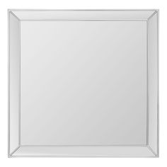 a white framed mirror on a wall with an empty space for the image to be taken