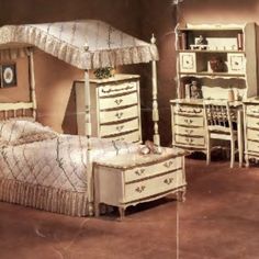 a bedroom scene with focus on the bed and dresser