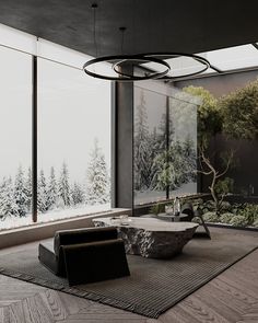 a living room filled with furniture next to large windows covered in frosted glass walls