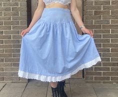 Lovely vintage Dirndl cotton skirt with lace.  Excellent condition. Material: cotton Size : 176, I think it will fit size M.  Model is size M and 170 cm height.  **This item will come to you freshly laundered and ready to wear. **If you want to purchase more items, please message me, I will make a special price and delivery. High Waist Cotton Gathered Skirt, Flowy Cotton Petticoat For Spring, High Waist Cotton Skirt For Daywear, Retro Style Cotton Flowy Skirt Bottoms, Vintage Gathered Skirt Bottoms For Summer, High Waist Gathered Cotton Skirt, Cotton Skirt With Lace Trim For Daywear, Vintage Gathered Skirt For Summer, Retro Skirted Cotton Bottoms