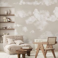 a living room filled with furniture and clouds painted on the wall