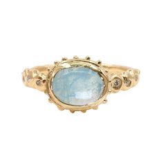 Gold & Stone Ring - This 14k gold ring shines brightly, with 1.3mm sparkling white diamonds cascading down from an aquamarine cabochon set at the center.  A wearable reminder that the sun will rise again! Available in half sizes 510. Gold Stone Ring, The Sun Will Rise Again, Aquamarine Birthstone Ring, Aquamarine Engagement Ring Vintage, Sea Rings, The Sun Will Rise, Aqua Ring, Aquamarine Engagement Ring, Aquamarine Stone