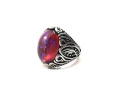 "This ring is exquisite! The focal point of this ornate filigree Victorian style ring is the 13x18mm Glass Cabochon which has been made in the style of a Mexican Opal also known as Dragon's Breath (made from glass not a gemstone). With each slight turn, the colors shift from deep scarlet red to lightening strikes of blues! Mexican Opal, also known as Dragon's Breath, is a collector's nickname for man-made stones that are made of glass and mixed with certain metals to produce a brilliant color sh Dragons Breath Opal, Mexican Fire Opal Ring, Victorian Style Rings, Jelly Opal, Mexican Opal, Dragons Breath, Mexican Fire Opal, Fire Opal Ring, Filigree Ring