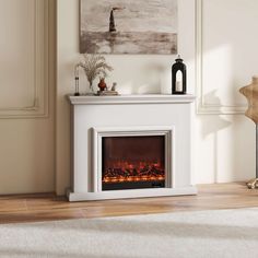 a white fireplace with a painting on the wall