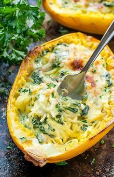 a close up of a casserole dish with broccoli and cheese in it