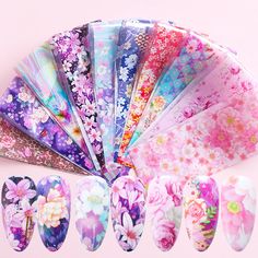 PRICES MAY VARY. Nail Art Design: 10 Sheets colorful flowers nail transfers stickers, The designer uses a large number of large flowers and small flowers combined with pink, purple, blue, and rainbow elements to create a flower sea of nails. Safe: Nail foil decals are made of environmentally friendly materials, non-toxic, not limited to any nail styles, easy to remove with nail polish, you can use it safely. Easy to Use: Press the foils on your nails after applying colored polish, just a few sec Roses Valentine, Acrylic Nail Supplies, Nail Foils, Foil Nail Art, Nail Foil, Colorful Nail, Nail Stickers Decals, Marble Nail Art, Transfer Foil