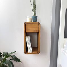 This completely handmade nightstand is made entirely of natural wood. The edges are ovalized to give a soft appearance.   It puts everything you want at your bedside. You can put anything near you on it, such as lampshades, books, phones, wallets, phones. Thanks to its minimal but useful drawer, it allows you to put your jewelry, wallet, glasses and watch in it and use it practically whenever you want. Color Light Oak You can choose other colors from the drop-down menu.    Dimensions📏:  W:7.6"( Small Narrow Nightstand, Small Nightstand Ideas, Creative Nightstand Ideas, Floating Nightstand Drawer, Wall Nightstand, Wall Mounted Nightstand, Floating Bedside Shelf, Slim Bedside Table, Wall Mounted Bedside Table