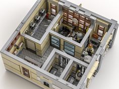 a lego model of a kitchen and living room in a house with an open floor plan