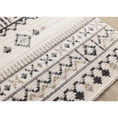 Experience the allure of boho artistry with our cream gray black beige southwestern pattern area rug. Meticulously crafted in Turkey from premium Heatset Polypropylene, its unique ribbed texture, and captivating color scheme infuse your space with warmth and style. This rug features an intriguing pattern illustrated by geometric shapes, intricate lines, and bold stripes. Transform your space with the rug today! Union Rustic Rug Size: Rectangle 5'3" x 7'7" | Black;cream Rectangle 5'3" x 7'7" Area Blue Striped Rug, Poppy Rug, Southwest Area Rugs, Throw Pillow Fabric, Natural Mattress, Southwestern Patterns, Mattress Box Springs, Pattern Rug, Shag Area Rug