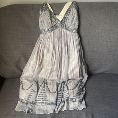 Silver / Grey Delicate Piece May Have Minor Flaws Grey Halloween Dress, Elegant Silver Silk Dress, Silver Silk Party Dress, Gray Embellished Dresses For Prom Season, Silver Silk Dress For Cocktail, Vintage Dress Gray, Silver Silk Dress For Spring, Summer Silver Silk Dress, Silver Silk Cocktail Dress