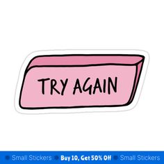 a pink sticker with the words try again on it