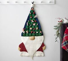 a christmas tree hanging on the wall