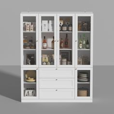 a white cabinet filled with lots of bottles