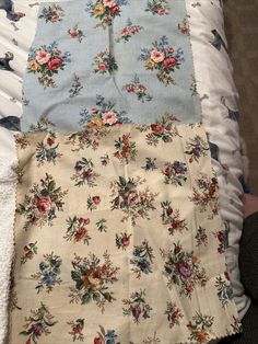 three pieces of fabric laid out on top of each other in different colors and patterns