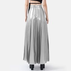 Step into effortless elegance with the Solace Vegan Leather Pleated Maxi Skirt in metallic silver. With a hidden zip closure and stylish golden embellishments, this skirt combines sophistication with a touch of luxury. The lightweight fabric drapes beautifully, offering a relaxed yet structured fit with just the right amount of stretch for comfort and durability. The vertical hand-pleating creates a flattering silhouette by elongating the lower body. Perfect for stylish occasions where comfort i Hand Pleating, Pleated Maxi Skirt, Pleated Maxi, Effortless Elegance, Draped Fabric, Lower Body, Independent Designers Fashion, Gifts For New Moms, Shirt Sale