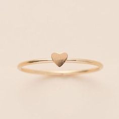 This heart ring adds an element of light and breezy to a stack. It can signify love and adoration for anyone in your life.  We personally like to stack it with a birthstone & any another textured rings. Details:Location: Finger (order larger or smaller sizes depending on which finger you choose to wear it)Thickness Textured Ring, Stacking Ring, Stacking Rings, You Choose, Rose Gold Ring, Birthstone, Heart Ring, Gold Filled, Gold Rings