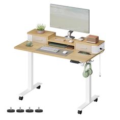 a computer desk with a monitor and keyboard on it