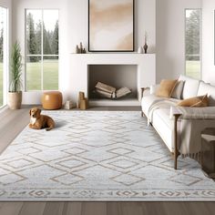 a living room with a dog laying on the floor in front of a fire place