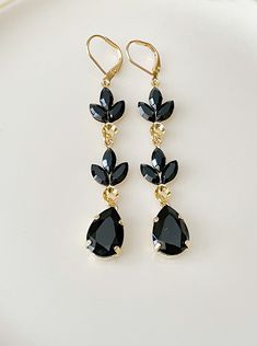 "Gorgeous pair of long earrings featuring Swarovski jet black crystals.  2 7/8\" long.  Shown in the gold metal finish. Thanks for stopping by!" Black And Gold Jewelry, Black And Gold Earrings, Black Jewellery, Black Crystal Earrings, Black Drop Earrings, Black Bridesmaid, Spring Formal, Dance Ideas, Prom 2024