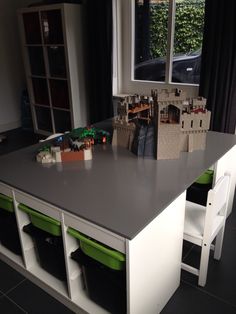 a kitchen counter with some legos on it