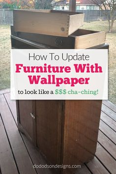 the furniture with wallpaper is sitting on top of a wooden table in front of a yard