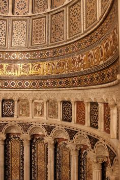 an intricately decorated ceiling in the middle of a building