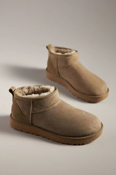 UGG Classic Ultra Mini Boots | Anthropologie Ugg Classic Ultra Mini Boots, Ugg Short Boots, Ugh Shoes, Shoe Wishlist 2024, Ugg Minis, Mini Uggs, Fall Shoes 2024, Uggs Mini, Ultra Mini Ugg