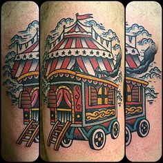 an image of a circus tent tattoo on the leg