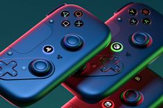 two video game controllers with different colored buttons